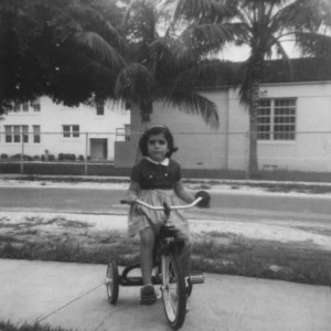 1963 The nation's first bilingual education program student in front of Coral Way Elementary School